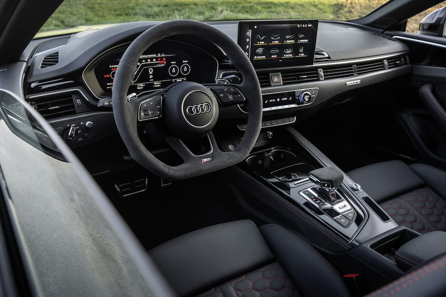 //images.ctfassets.net/uaddx06iwzdz/7AIMjKqs1Rd2r8Sk7rw3ob/51d6c97bb192fd653449ba3023992e20/audi-rs5-interior.jpg "Audi RS5 Interior"