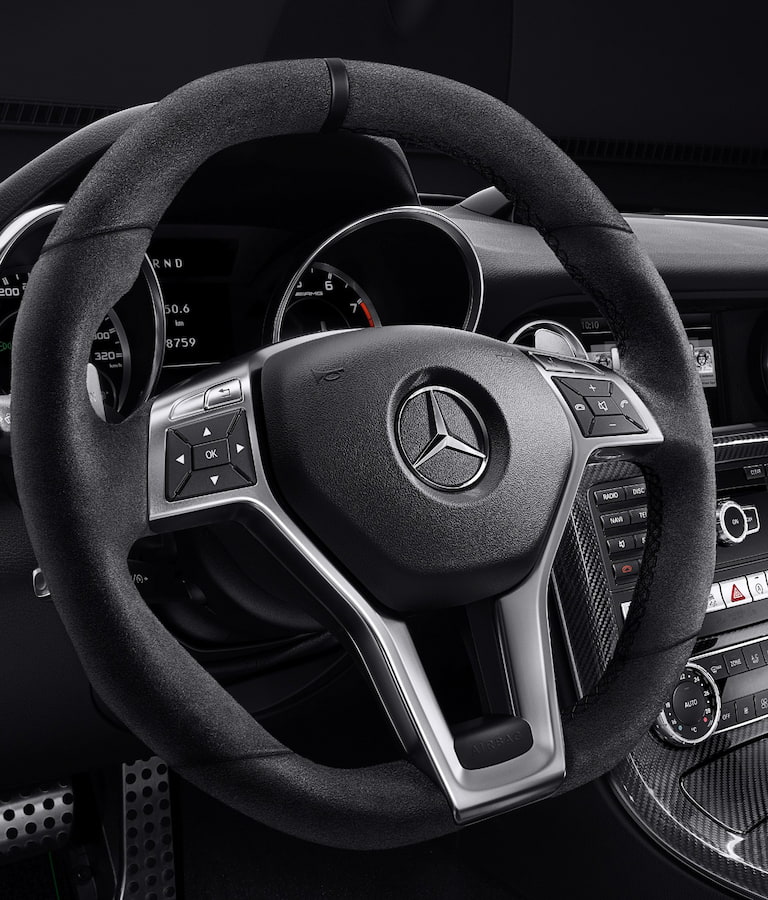 //images.ctfassets.net/uaddx06iwzdz/6sikeQRUl4CFbtRSmOuUHv/0e92adc5976e066cc1cea16e3b6006f8/mercedes-slc-steering-wheel.jpg "Mercedes-Benz SLC Wheel"