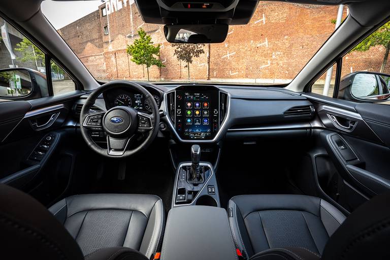  The interior of the new Subaru Impreza is solid and functional.  The infotainment system supports wireless Apple CarPlay.