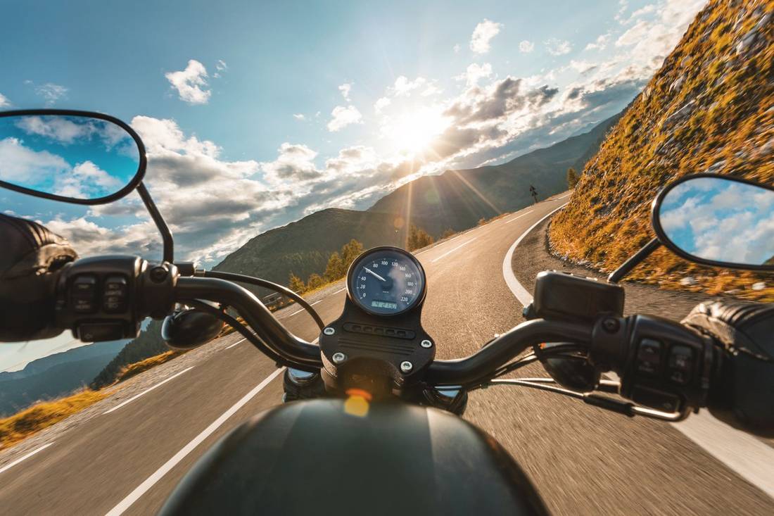 Riding a motorcycle on a sunny day
